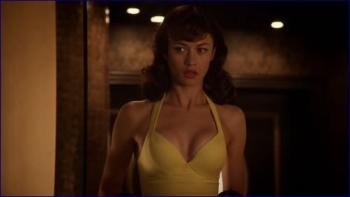 608981601_olga-kurylenko-magic-city-image-1-15.jpg